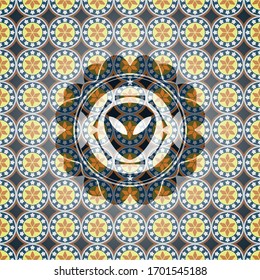 alien icon inside arabic style emblem. Arabesque decoration.