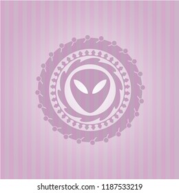 alien icon inside badge with pink background