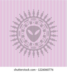 alien icon inside badge with pink background