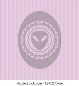 alien icon inside badge with pink background
