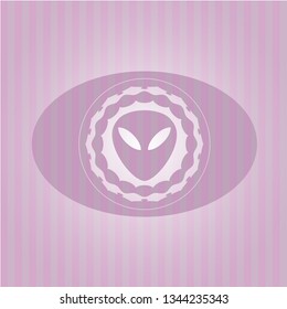 alien icon inside badge with pink background