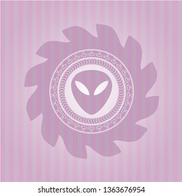 alien icon inside badge with pink background