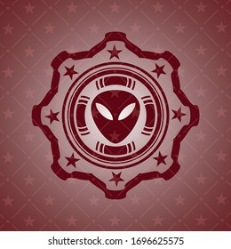 icono alienígena dentro de la placa con fondo rojo