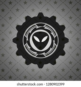 alien icon inside black badge