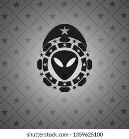 alien icon inside black badge