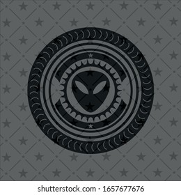 alien icon inside black badge