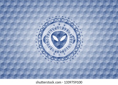 alien icon inside blue badge with geometric pattern.