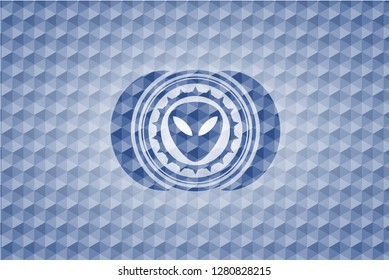 alien icon inside blue emblem with geometric background.