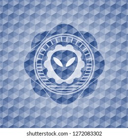 alien icon inside blue hexagon badge.