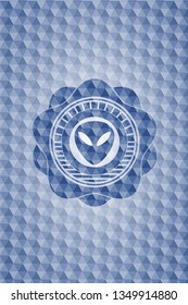 alien icon inside blue hexagon badge.