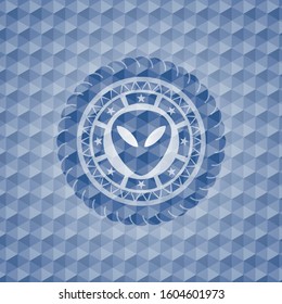 alien icon inside blue hexagon badge.