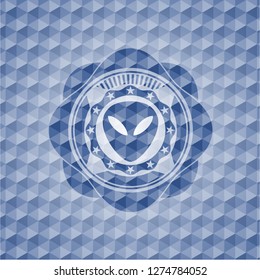 alien icon inside blue polygonal emblem.