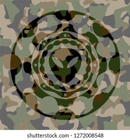 alien icon inside camouflage emblem