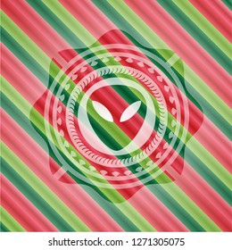 alien icon inside christmas badge.