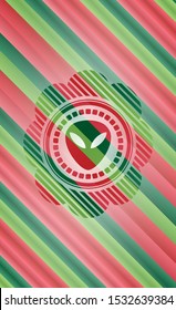 alien icon inside christmas badge.
