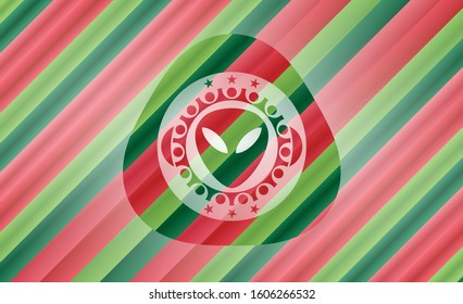 alien icon inside christmas colors style emblem.