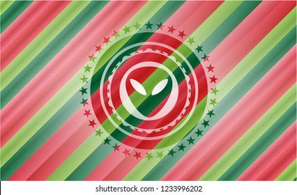 alien icon inside christmas style badge..