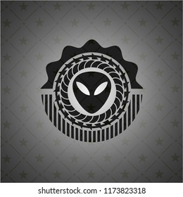 alien icon inside dark badge