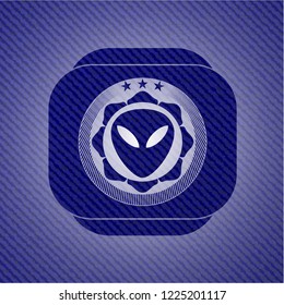 alien icon inside emblem with denim high quality background