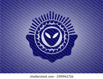 alien icon inside emblem with jean high quality background
