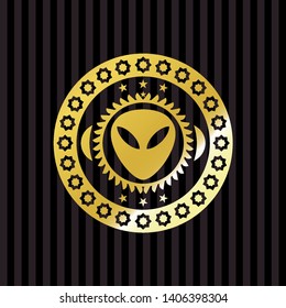 alien icon inside gold badge or emblem