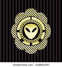 alien icon inside gold badge