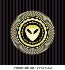 alien icon inside gold emblem or badge