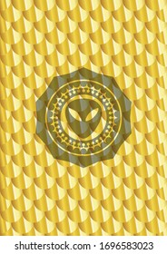 alien icon inside gold shiny emblem. Scales pattern. Vector Illustration. Detailed.