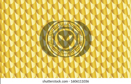 alien icon inside golden badge. Scales pattern. Vector Illustration. Detailed.