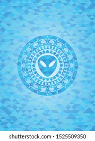 alien icon inside light blue emblem with mosaic background