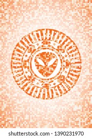 alien icon inside orange mosaic emblem