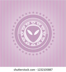 alien icon inside pink emblem