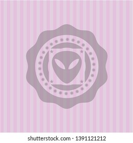 alien icon inside pink emblem