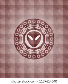 alien icon inside red seamless geometric badge.