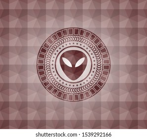 alien icon inside red seamless geometric emblem.