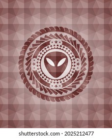 alien icon inside red seamless geometric badge. 