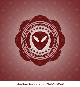 alien icon inside retro red emblem