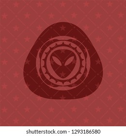alien icon inside retro red emblem