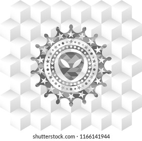 alien icon inside retro style grey emblem with geometric cube white background