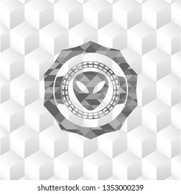 alien icon inside retro style grey emblem with geometric cube white background