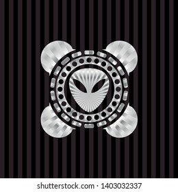 alien icon inside silver badge