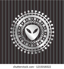 alien icon inside silver emblem