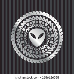 alien icon inside silver emblem