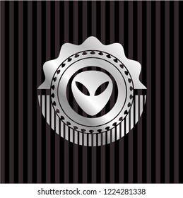 alien icon inside silvery shiny badge