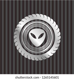 alien icon inside silvery shiny badge
