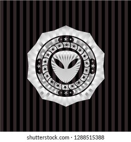 alien icon inside silvery shiny emblem