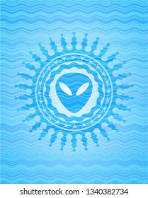 alien icon inside sky blue water wave badge.