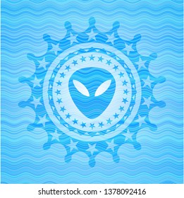 alien icon inside sky blue water badge background.