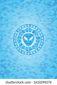 alien icon inside sky blue mosaic emblem