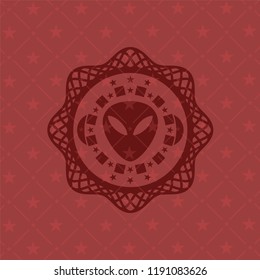 alien icon inside vintage red emblem
